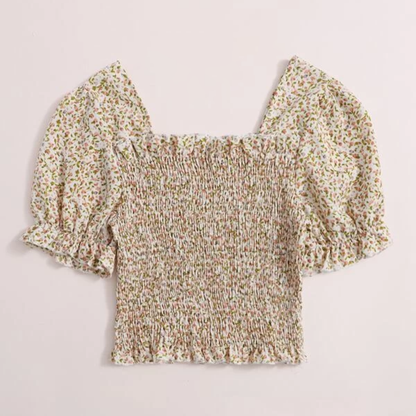 Blusa fruncida con margaritas. - M