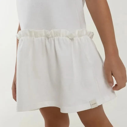 Vestido blanco tipo polo para niña