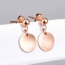 Aretes de disco redondo de acero inoxidable golden rose.