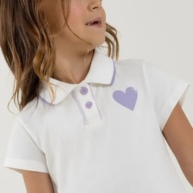 Vestido blanco tipo polo para niña