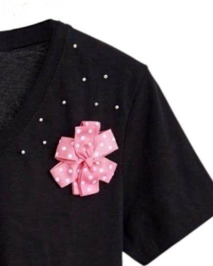 Blusa negra con flor rosada de punto Talla XL