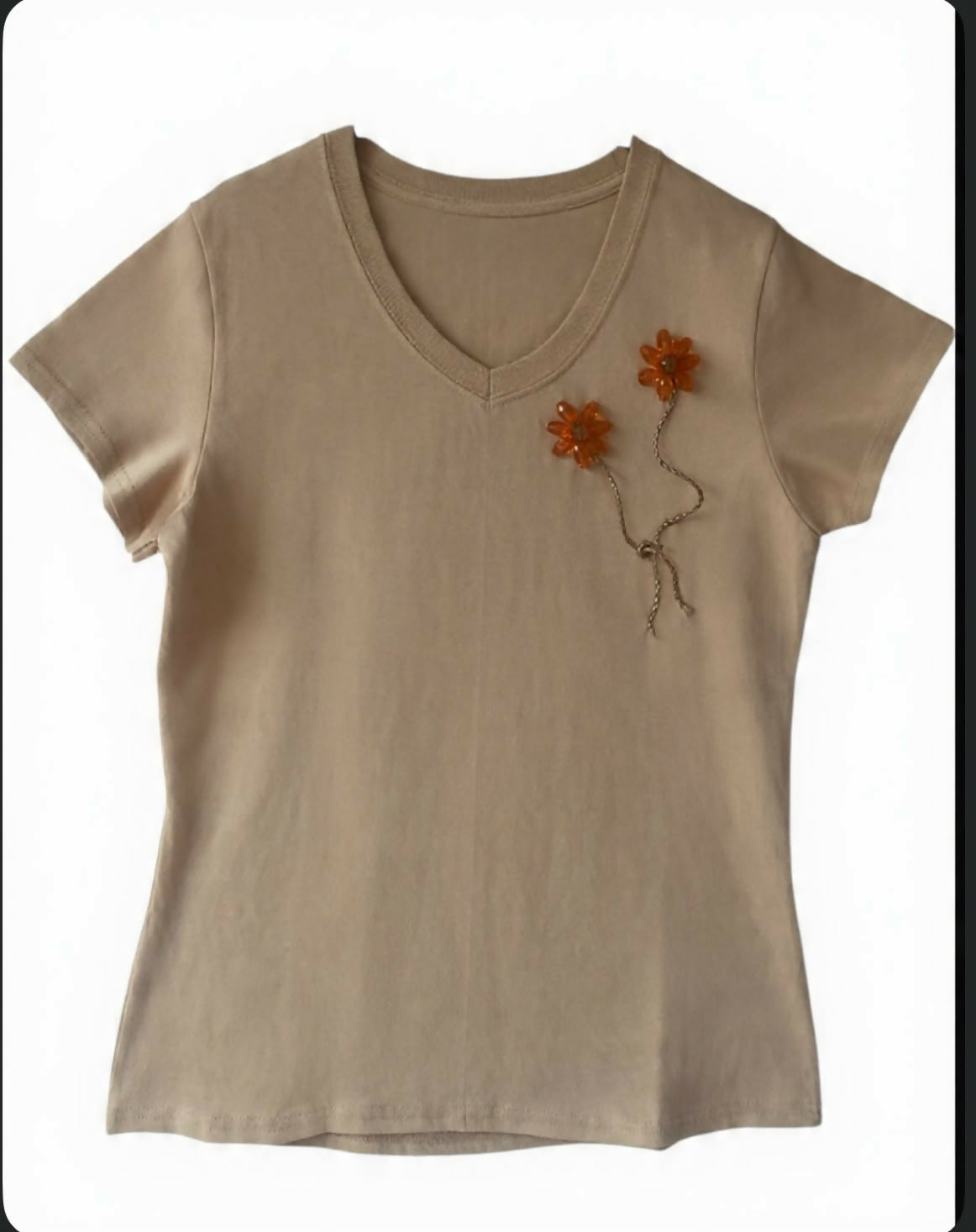 Blusa Nude con flores anaranjadas y lazo café Talla M